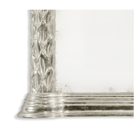 Carved and silver gilded hanging wall mirror