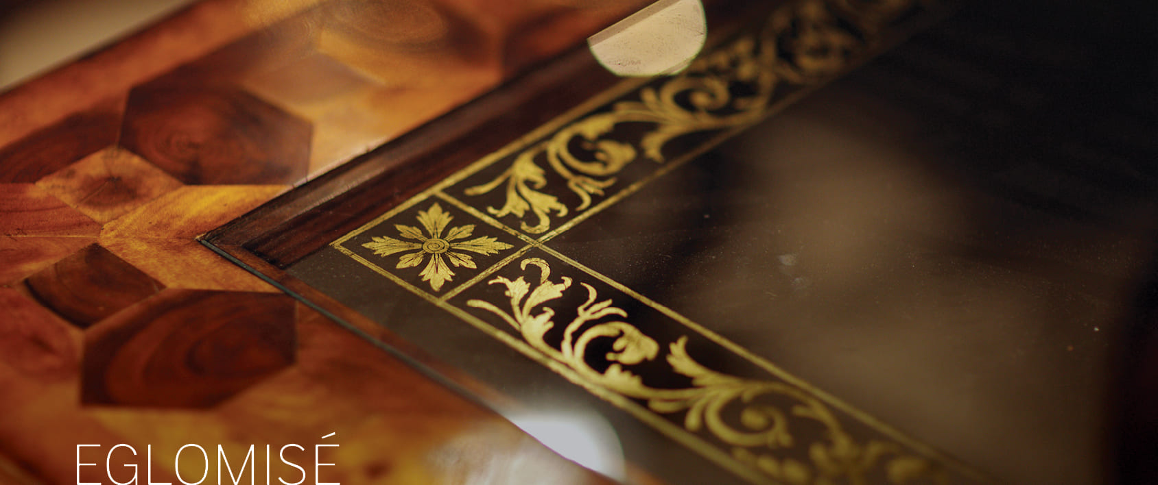 Églomisé gilded glass panel